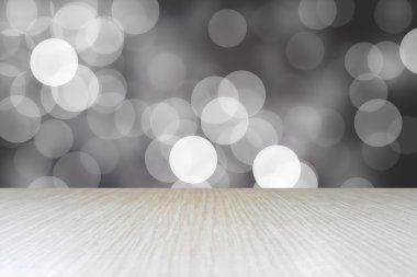 Soyut bokeh arka plan üzerinde ahşap tablosunun üst kısmındaki