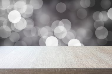 Soyut bokeh arka plan üzerinde ahşap tablosunun üst kısmındaki