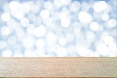 Soyut bokeh arka plan üzerinde ahşap tablosunun üst kısmındaki