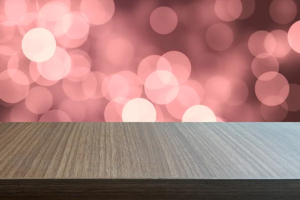 Верх дерев'яного столу на абстрактному фоні боке — стокове фото