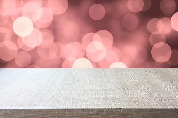 Верх дерев'яного столу на абстрактному фоні боке — стокове фото
