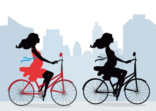 Silhouette di donne incinte in bicicletta — Vettoriale Stock