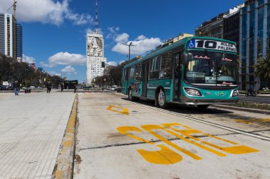 Public bus at the 9 de Julio Avenue in Buenos Aires, Argentina. clipart