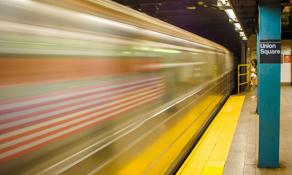 Distraced subway commuter misses her ride.