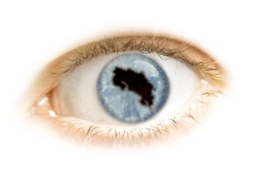 Close-up of an eye with the pupil in the shape of Costa Rica.(se