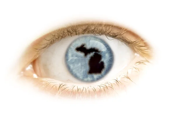 Close-up of an eye with the pupil in the shape of Michigan.(seri — Stock Photo, Image