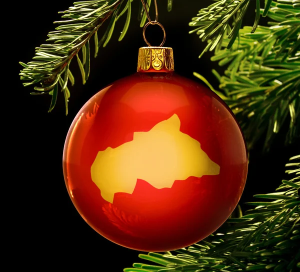 Red bauble with the golden shape of Central African Republic han — 图库照片