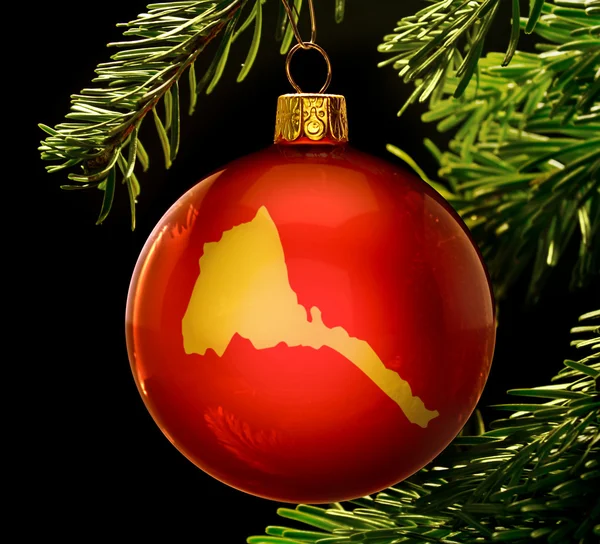 Red bauble with the golden shape of Eritrea hanging on a christm — 图库照片