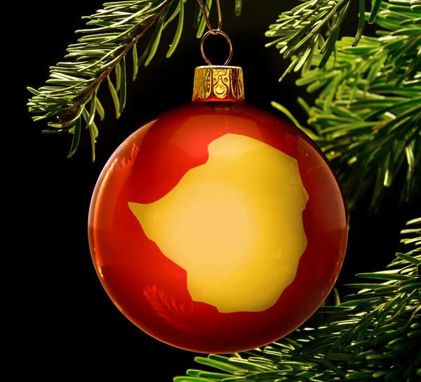 Red bauble with the golden shape of Zimbabwe hanging on a christ — 图库照片