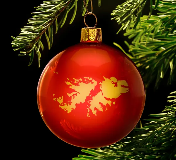 Red bauble with the golden shape of Falkland Islands hanging on — Stock Photo, Image