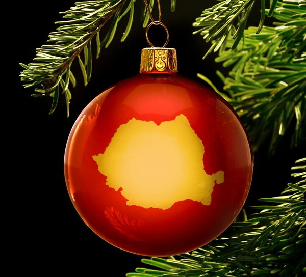 Red bauble with the golden shape of Romania hanging on a christm — 图库照片