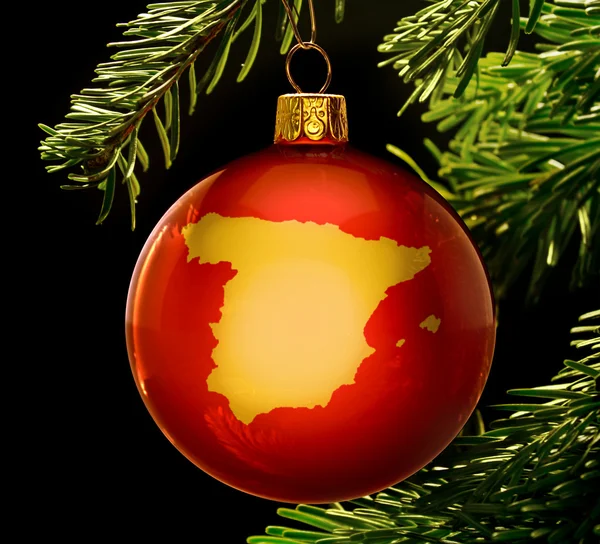 Red bauble with the golden shape of Spain hanging on a christmas — 图库照片
