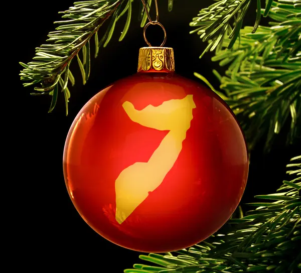Red bauble with the golden shape of Somalia hanging on a christm — Stock Photo, Image