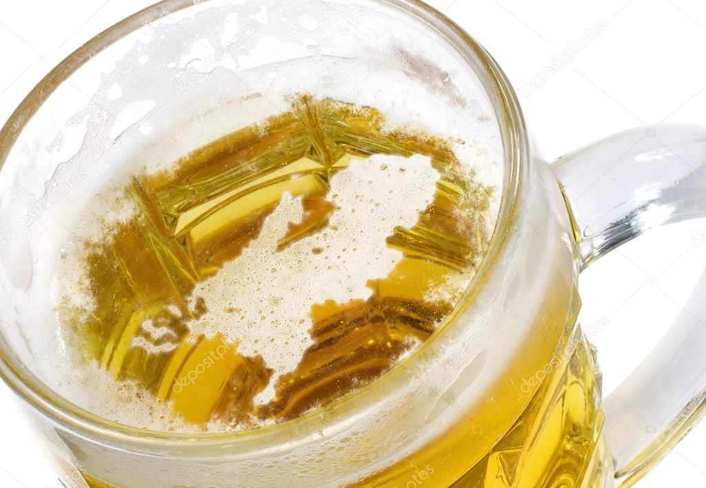 Beer head shaped as Netherlands in a beer mug.(series)