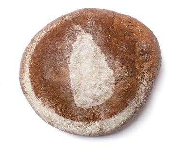 A loaf of fresh bread covered with rye flour in the shape of Sri