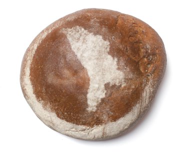 A loaf of fresh bread covered with rye flour in the shape of Mol