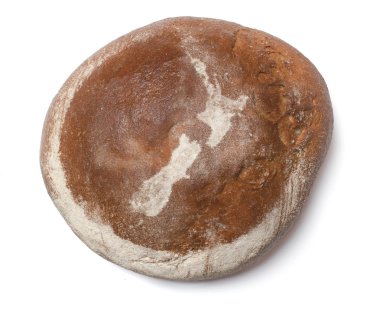 A loaf of fresh bread covered with rye flour in the shape of New