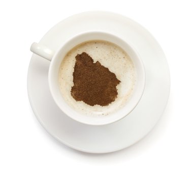 Cup of coffee with foam and powder in the shape of Uruguay.(seri