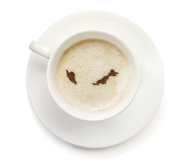 Cup of coffee with foam and powder in the shape of Malaysia.(ser