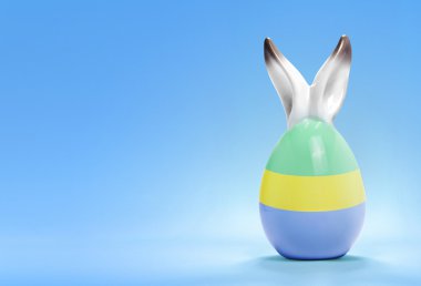 Colorful cute easter egg and the flag of Gabon .(series)