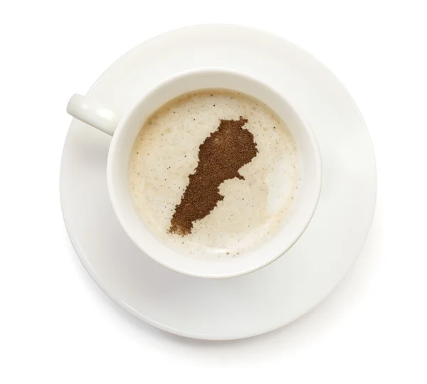 Cup of coffee with foam and powder in the shape of Lebanon.(seri 免版税图库照片