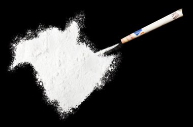 Powder drug like cocaine in the shape of New Brunswick.(series)