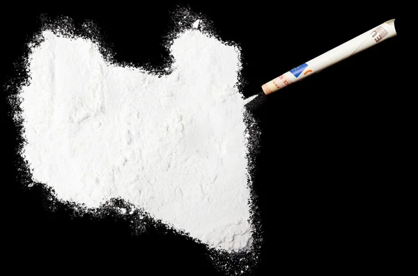 Powder drug like cocaine in the shape of Libya.(series) — Stock fotografie