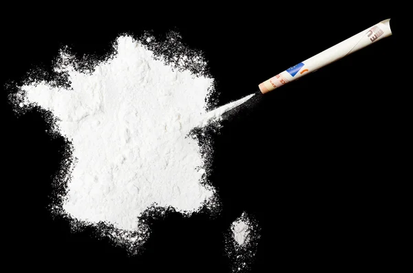 Powder drug like cocaine in the shape of France.(series) 免版税图库图片