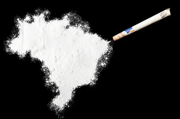 Powder drug like cocaine in the shape of Brazil.(series) Royalty Free Εικόνες Αρχείου