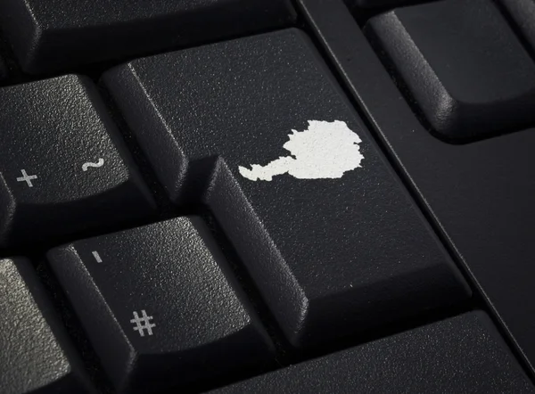 Клавіатура з клавішею повернення у формі Австрії. (серія ) — стокове фото