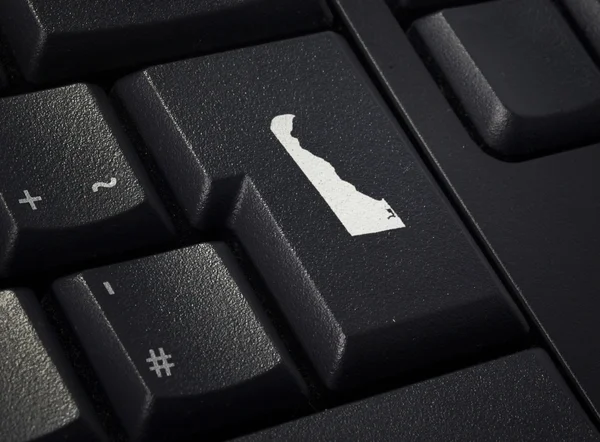Keyboard with return key in the shape of Delaware.(series) — Stock Photo, Image