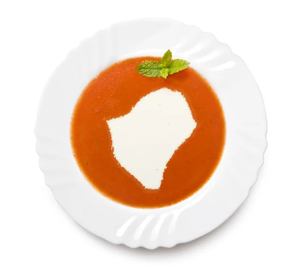 Плита томатный суп со сливками в форме Бурунди. (серия ) — стоковое фото