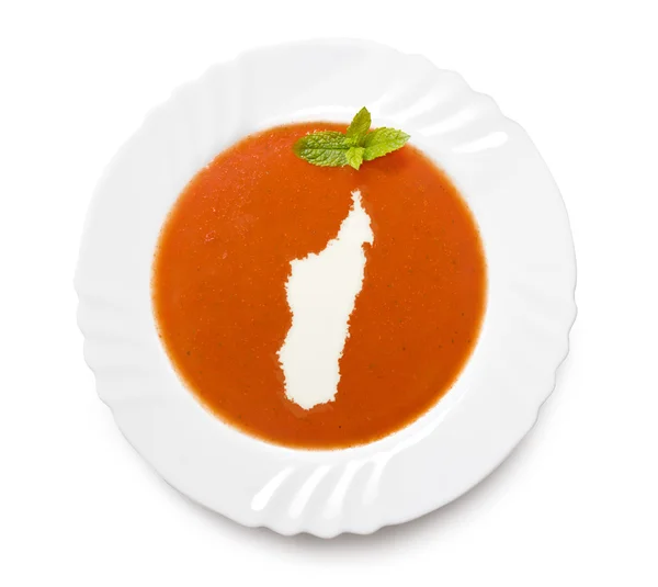 Sopa de tomate de plato con crema en forma de Madagascar. (serie ) —  Fotos de Stock