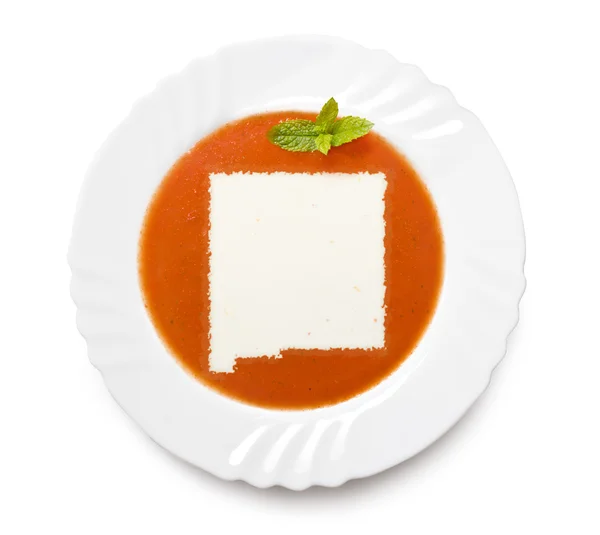 Плита томатный суп со сливками в форме Нью-Мексико. (серия ) — стоковое фото