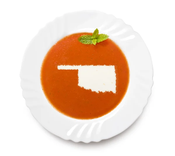 Плита томатный суп со сливками в форме Оклахомы. (серия ) — стоковое фото