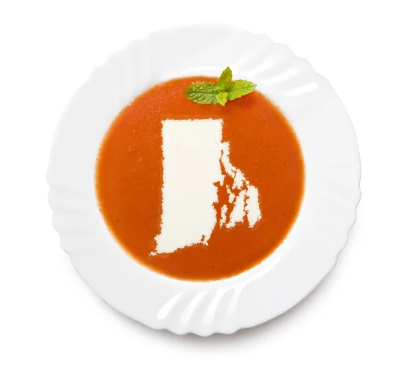 ロードアイランド州の形をしたクリーム プレート トマトのスープ。(セリエ — ストック写真