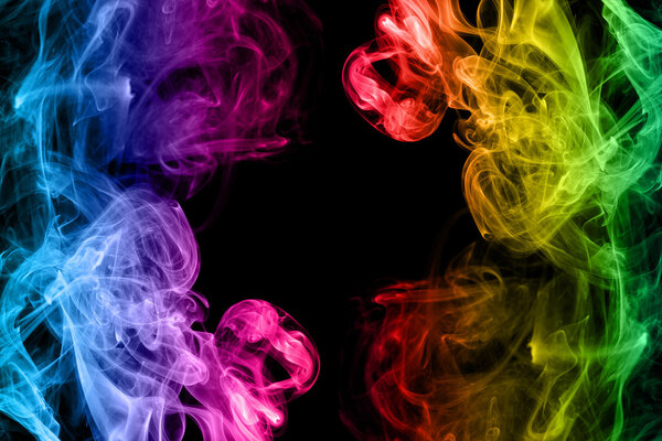 Rainbow smoke abstract on black background with copy space, concept colorful style
