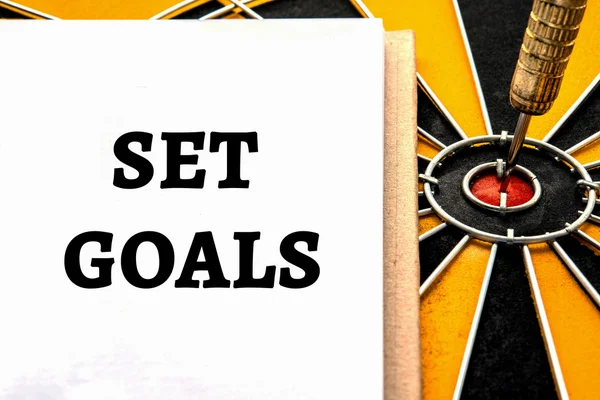 Words set goals with dart target — Stock Photo, Image