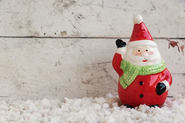 Santa claus in de sneeuw — Stockfoto