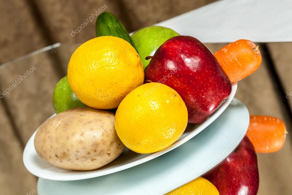 Plate of fruits and vegetables — Stock Photo © robinsonthomas2005 121389384