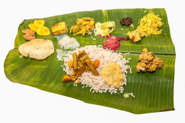 Onam Sadhya Kerala vejetaryen yemek Festivali vesilesiyle bir muz yaprak servis olduğunu