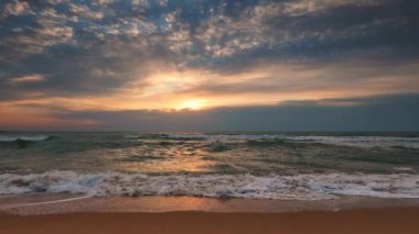 Ocean sunrise and tropical beach on island, 4k video