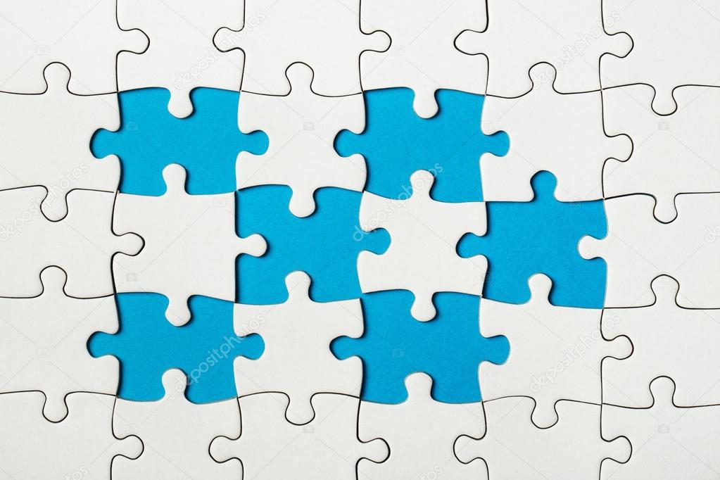 Jigsaw puzzle with missing piece. Missing puzzle pieces Stock Photo