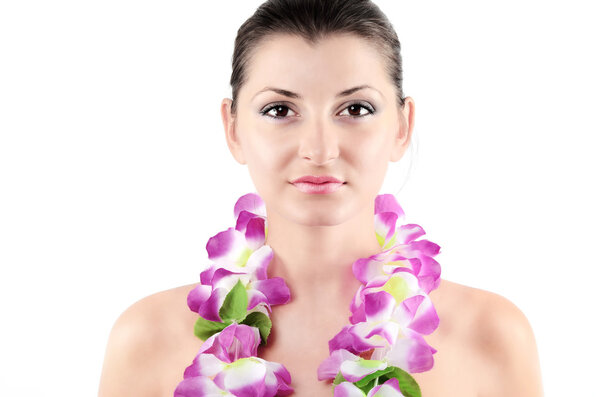 Portrait of beautiful young girl with clean skin and wreath flow