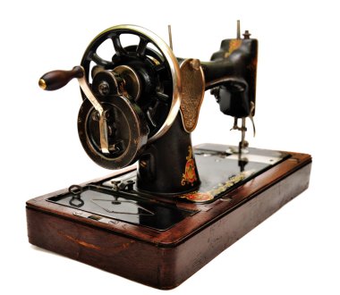 beyaz üzerine eski dikiş makinesi