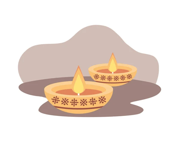 Dos velas de religión hindú de oro decoración — Vector de stock