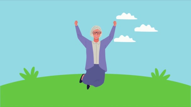 Animasyon karakterini kutlayan mutlu yaşlı kadın — Stok video