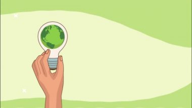 Dünyayı kurtaralım. Ampul içinde Dünya gezegenini elle kaldırarak.