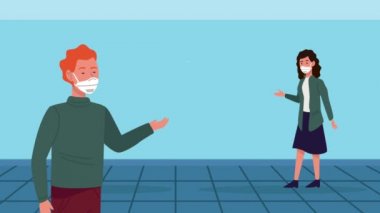 Sosyal mesafeli tıbbi maskeler takan çift