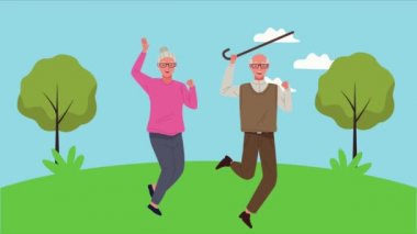 Mutlu yaşlı çift animasyon karakterlerini kutluyor.